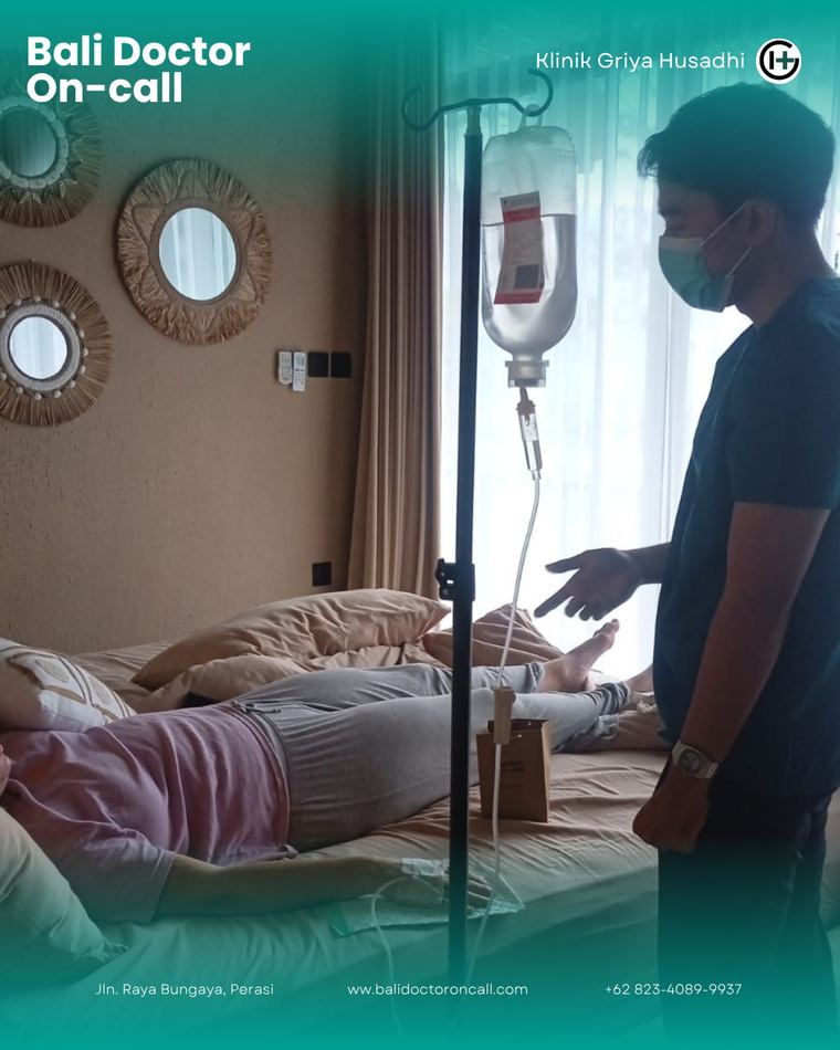 Doctor treating patient at villa